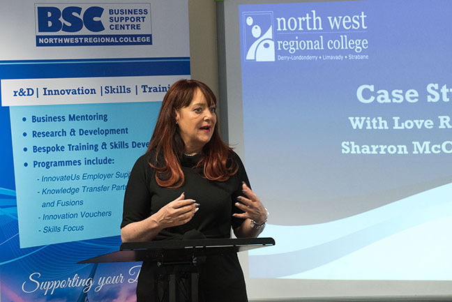 Sharron McCormick of With Love Recipes speaking at NWRC's Strabane Business Breakfast event about the upskilling support she received from NWRC Foodovation Centre.