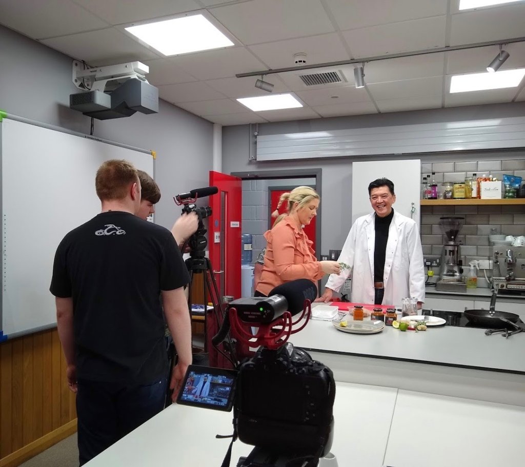 Terence Lesslar Owner of The Good Sauce Company being filmed by NWRC Media students as part of their project