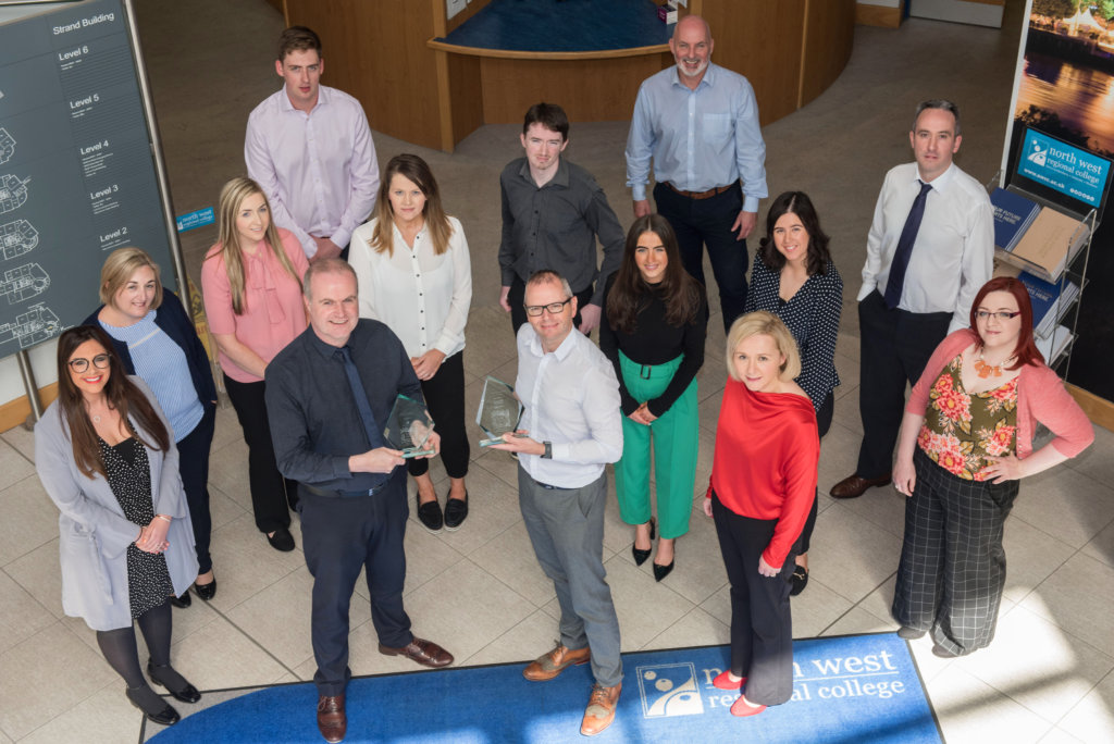 Conor McGurgan, Marketing and PR manager and Fergal Tuffy, Technology Innovation Manager with the Marketing and PR team and Business Support Centre team at North West Regional College, double award winners at the 2019 North West Business Awards