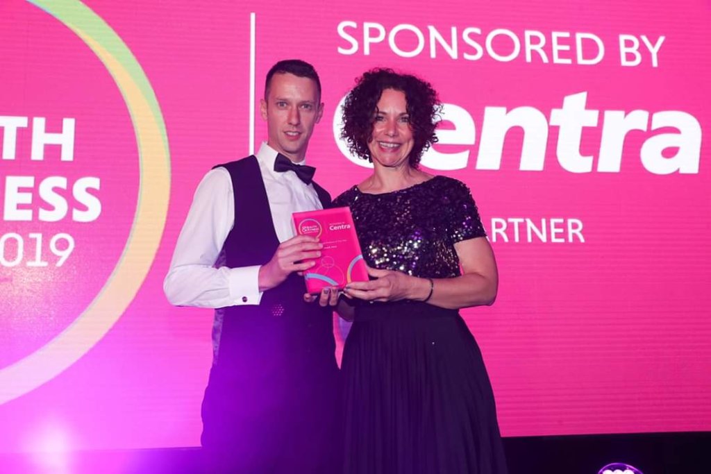 Gerard Curran owner of SoGoodJuice receiving his 'Health and Fitness Product of the Year' award from nutritionist Jane McClenaghan.